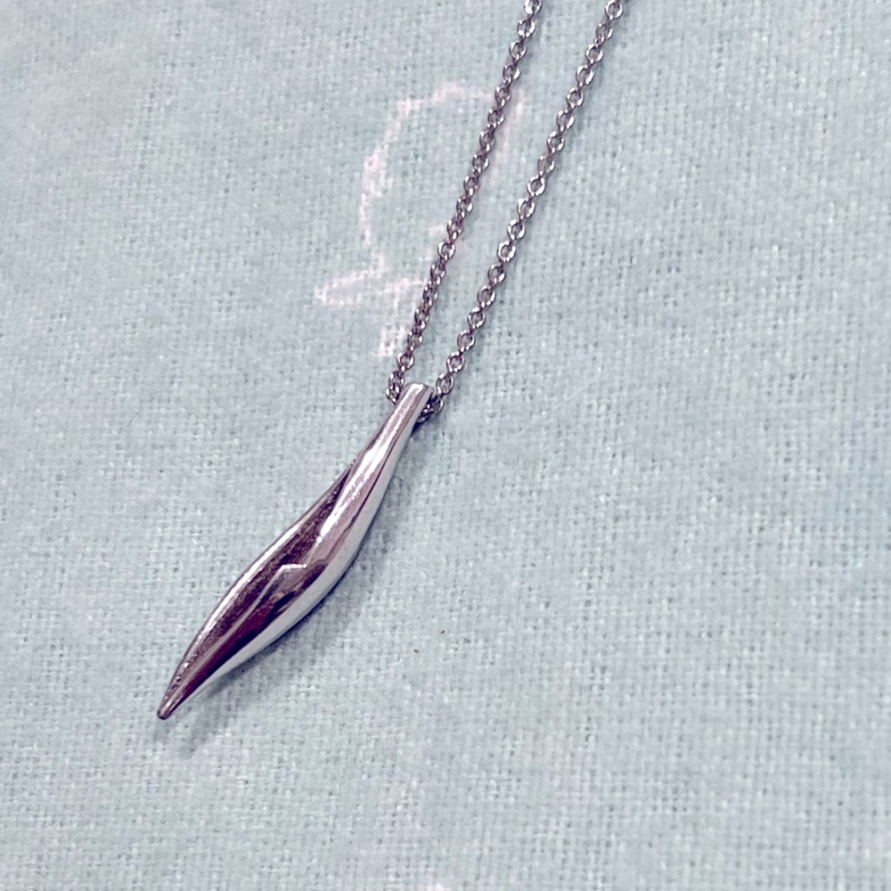 Movado sterling silver dainty chain with sterling silver leaf pendant
